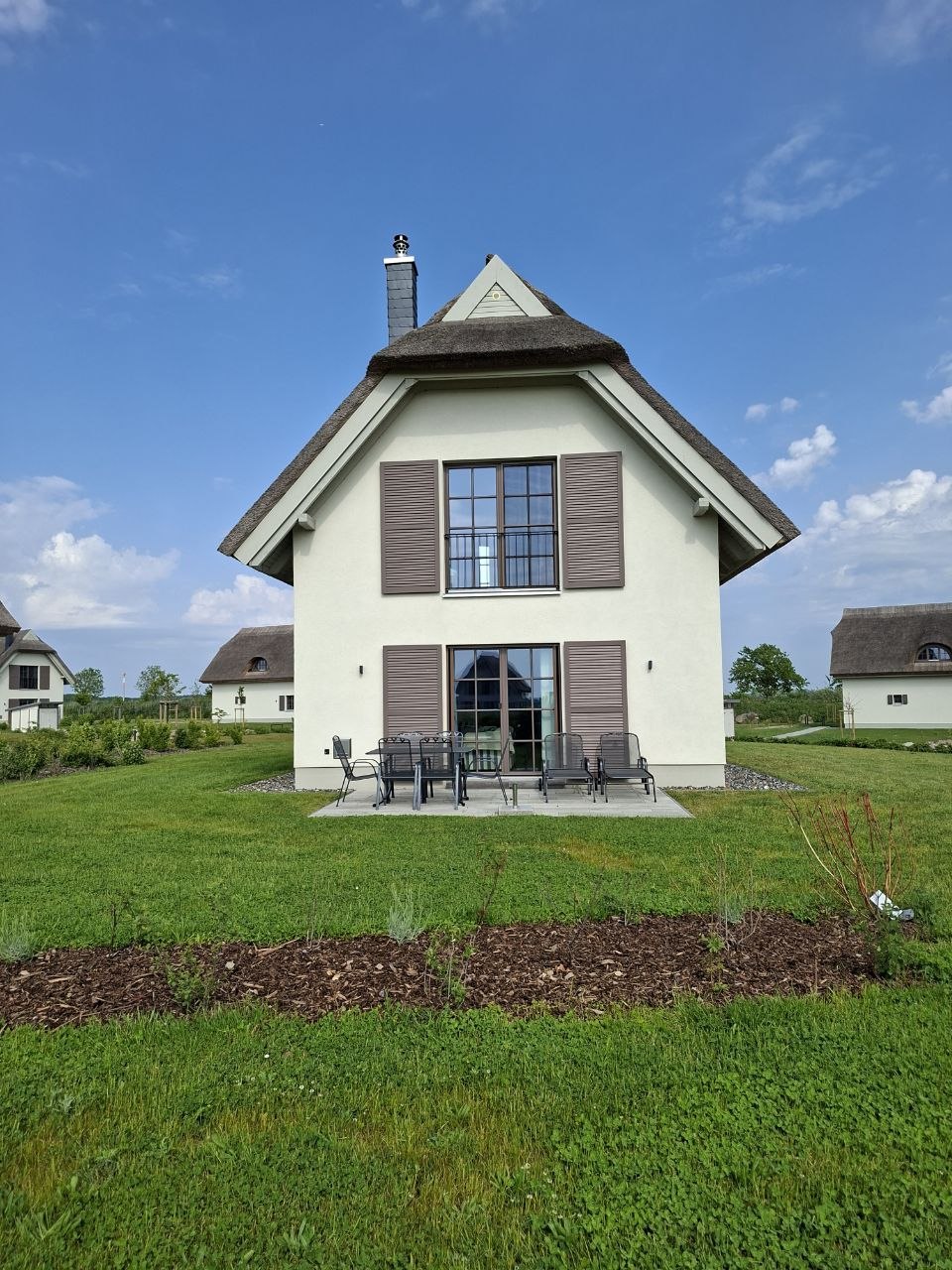 Reetdachhäuser im Feriendorf Reetland am Meer